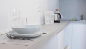 O bucătărie sau chicinetă la Italianway - The B Village Superior