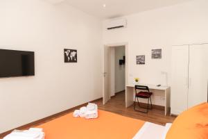 Katil atau katil-katil dalam bilik di Trastevere Magic House Luxury Suite
