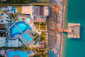 an overhead view of a building next to the water at Kirman Sidera Luxury & Spa in Okurcalar