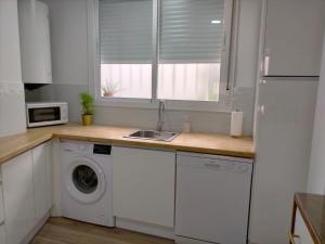 Η κουζίνα ή μικρή κουζίνα στο Apartamento Lola Home