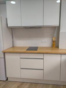 Η κουζίνα ή μικρή κουζίνα στο Apartamento Lola Home +12 φωτογραφίες