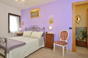 Postel nebo postele na pokoji v ubytování B&b Corte Giare