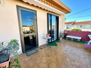 Μπαλκόνι ή βεράντα στο Appartement St Laurent +9 φωτογραφίες