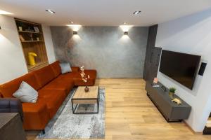 Televízia a/alebo spoločenská miestnosť v ubytovaní Parliament Dream Apartment!