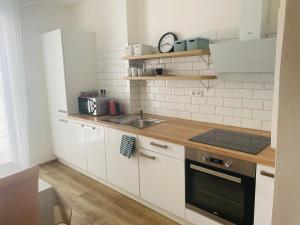 Kuchyň nebo kuchyňský kout v ubytování Apartmány Mikulčice
