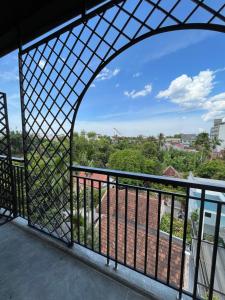 a view from the balcony of a building at Hue Sweethouse 2 Homestay in Hue