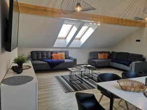 Posezení v ubytování Domki i apartamenty Skandynawia z basenem