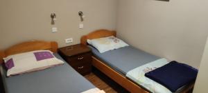 Postel nebo postele na pokoji v ubytování Apartments Svjeta