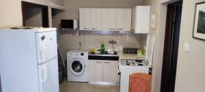 Kuchyň nebo kuchyňský kout v ubytování Apartments Svjeta