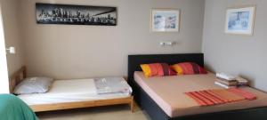 Postel nebo postele na pokoji v ubytování Apartments Svjeta