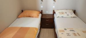 Postel nebo postele na pokoji v ubytování Apartments Svjeta