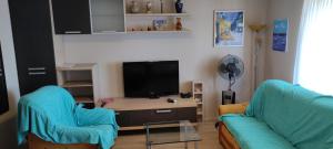 TV a/nebo společenská místnost v ubytování Apartments Svjeta