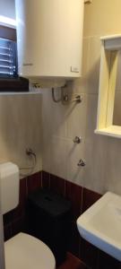 Koupelna v ubytování Apartments Svjeta