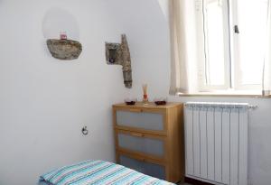 Postel nebo postele na pokoji v ubytování Dimora Eirek