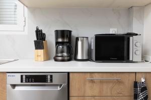 Køkken eller tekøkken på Sea Breeze Villa + 10 billeder