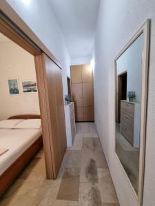Postel nebo postele na pokoji v ubytování Apartmani Marić