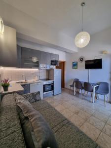 Kuchyň nebo kuchyňský kout v ubytování Apartmani Marić