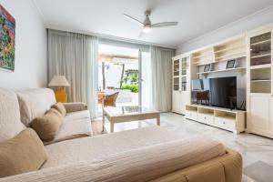 Et tv og/eller underholdning på Alcazaba Beach Apartment