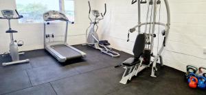 a gym with several exercise bikes in a room at seven acre farm campsite in Fiskerton
