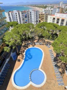 an overhead view of a swimming pool at a resort at Rentalmar Blue Beach Apartments & Pool in Salou