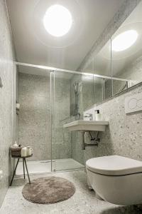 a bathroom with a toilet and a sink and a tub at Chalupa Morava in Veselí nad Moravou