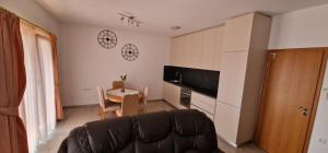 TV a/nebo společenská místnost v ubytování Apartments Stengl