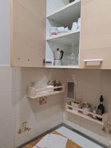 Una cocina o cocineta en Message in a bottle ,relax e calore