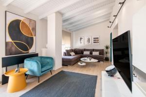 TV a/nebo společenská místnost v ubytování fragoseco loft! Elegance & Luxury