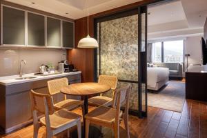 Ένα ή περισσότερα κρεβάτια σε δωμάτιο στο Kilin Hotel, JiaoXi