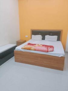 Krevet ili kreveti u jedinici u okviru objekta OYO Hotel Shiv Place