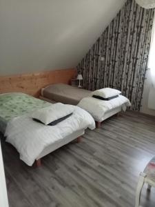 Postel nebo postele na pokoji v ubytování Marlibelle