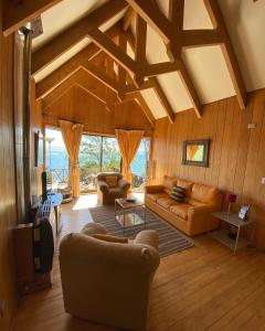 Posezení v ubytování Cabañas Bahia Celeste, Puerto Varas + 20 fotografií