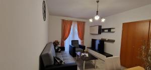 TV a/nebo společenská místnost v ubytování Apartments Stengl