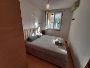 En eller flere senge i et værelse på RondoCondo Mostar