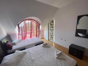 Postel nebo postele na pokoji v ubytování Kavarna Hills + 37 fotografií