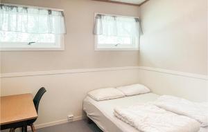 Llit o llits en una habitació de Amazing Home In Dovre With House A Panoramic View