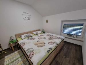 Postel nebo postele na pokoji v ubytování Apartmaji Ribic