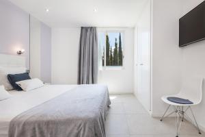 En eller flere senge i et værelse på Coração do Mar by OCvillas + 51 billeder