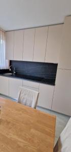 Kuchyň nebo kuchyňský kout v ubytování Apartments Stengl