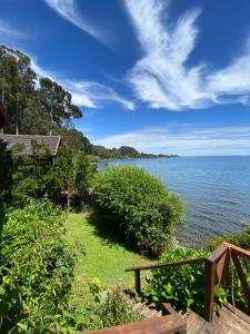 a view of the ocean from a house at Cabañas Bahia Celeste, Puerto Varas in Puerto Varas