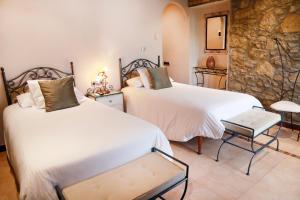 Postel nebo postele na pokoji v ubytování La Violeta HOTEL SPA & CHILL OUT