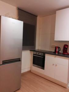 Dapur atau dapur kecil di Bel appartement familial