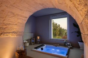 Fotografie z fotogalerie ubytování Essenza Relais Contemporaneo v destinaci Cisternino