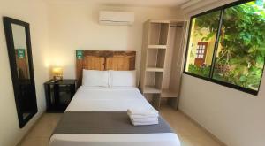 Casa Franco Hotel客房内的一张或多张床位
