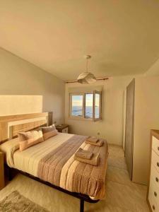 Un pat sau paturi într-o cameră la A Casa das Vistas