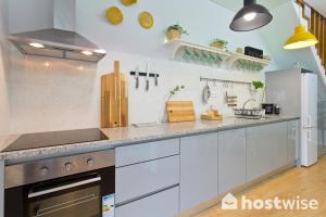 Kuchyň nebo kuchyňský kout v ubytování Comfortable Stunning Flats - City Center