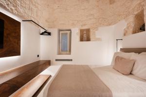 Postel nebo postele na pokoji v ubytování Essenza Relais Contemporaneo