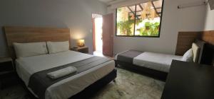 Casa Franco Hotel客房内的一张或多张床位
