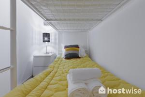Postel nebo postele na pokoji v ubytování Comfortable Stunning Flats - City Center