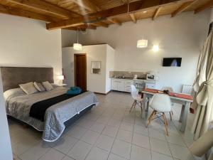 En eller flere senge i et værelse på Loft en zona centrica gastronómica D9 + 9 billeder